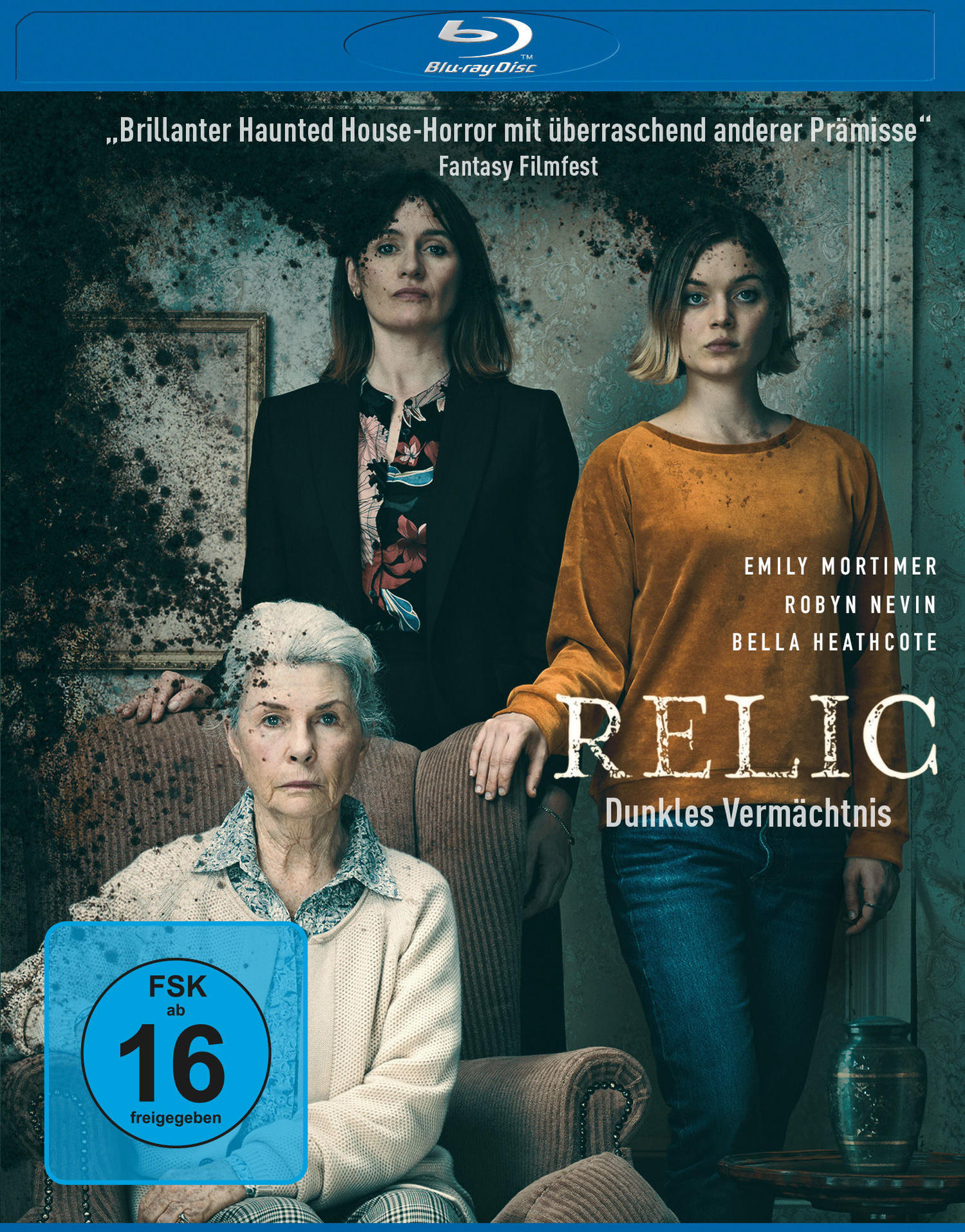 Filmcover: Drei Frauen stehen in einem Haus. Der Titel lautet Relic.