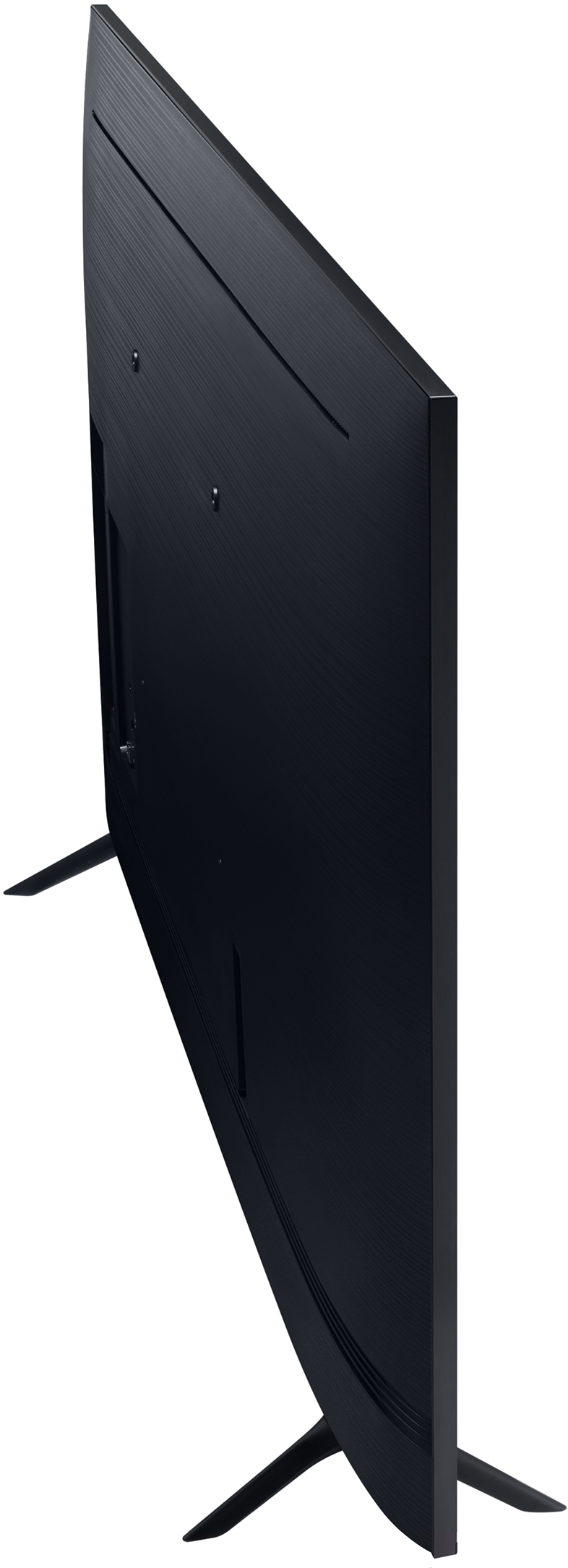 Ívelt fekete Samsung TV fehér felületen. A képernyő fekete, a tartólábak láthatók.