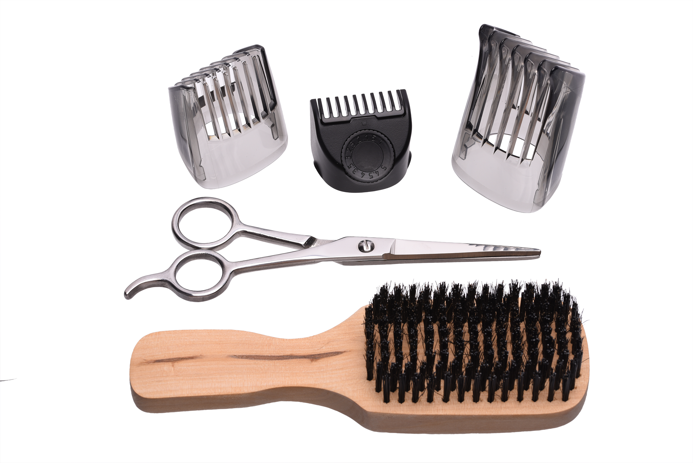 Barber set: scissors, brushes and trimmer heads.