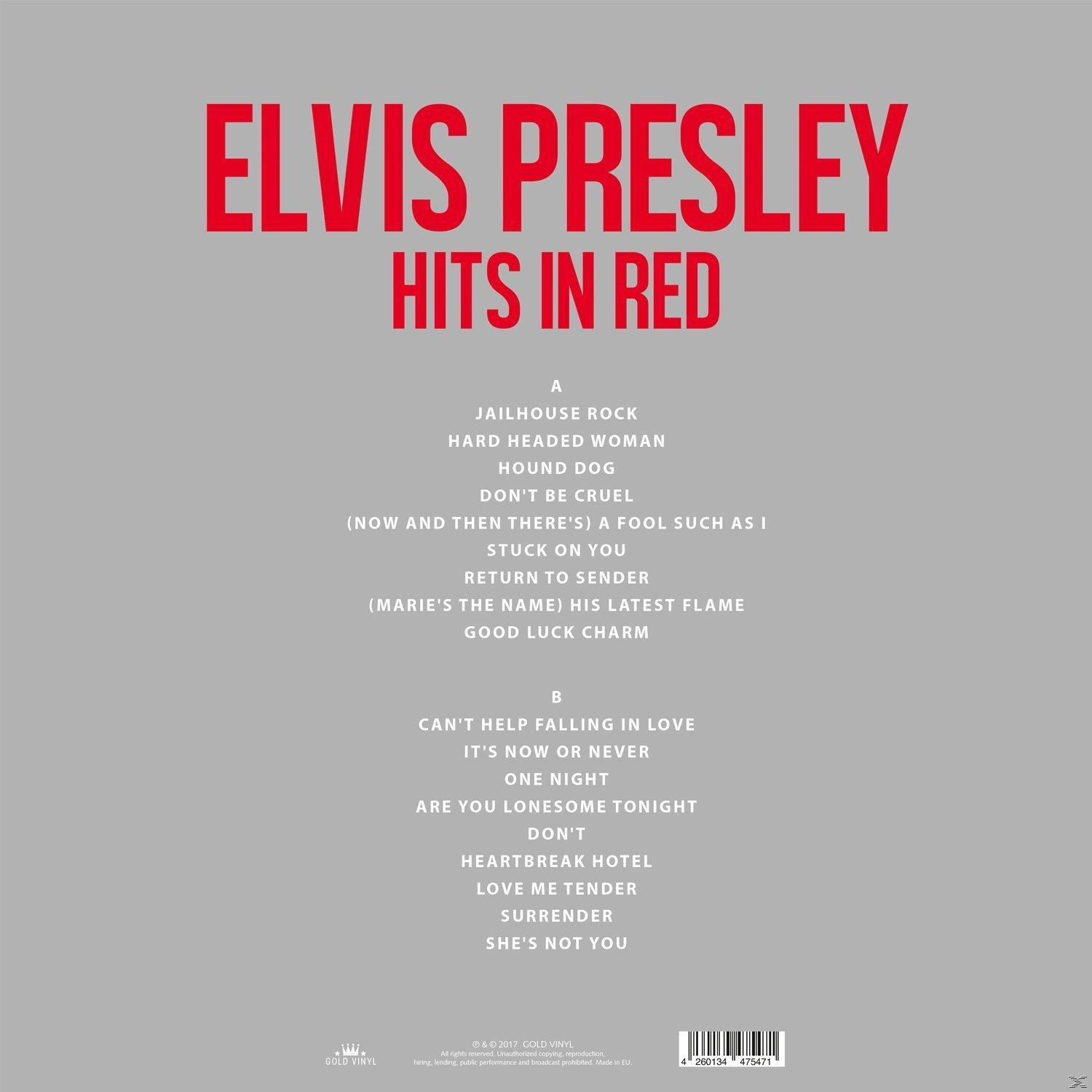 Album borító: Elvis Presley 'Hits in Red'. Piros szöveg szürke háttéren. Dalszöveg listázása, beleértve a 'Jailhouse Rock' és 'Heartbreak Hotel' dalokat.