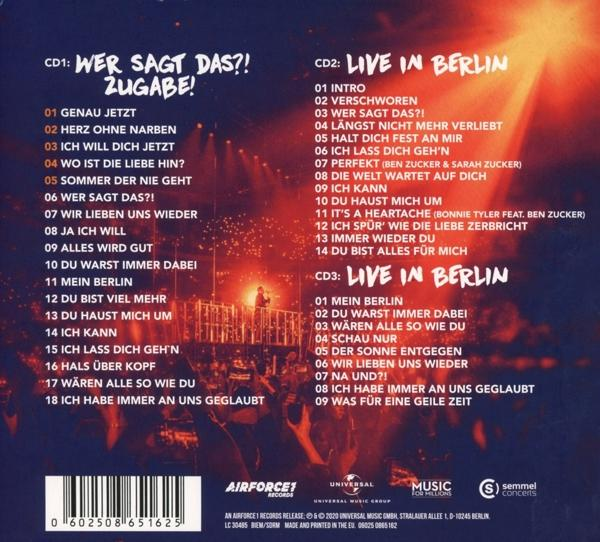 Die Rückseite einer CD-Hülle mit Titellisten und dem Albumtitel Wer Sagt Das?!