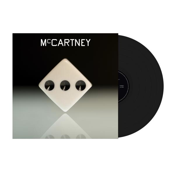 McCartney-Albumcover mit Würfelgrafik und einer schwarzen Schallplatte.