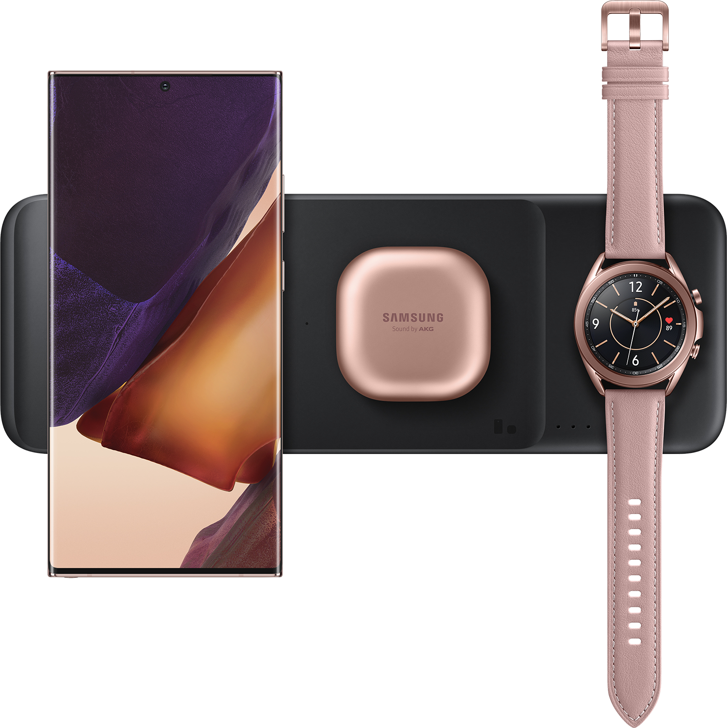A phone, wireless charger, earbuds, and watch, all rose gold and black.