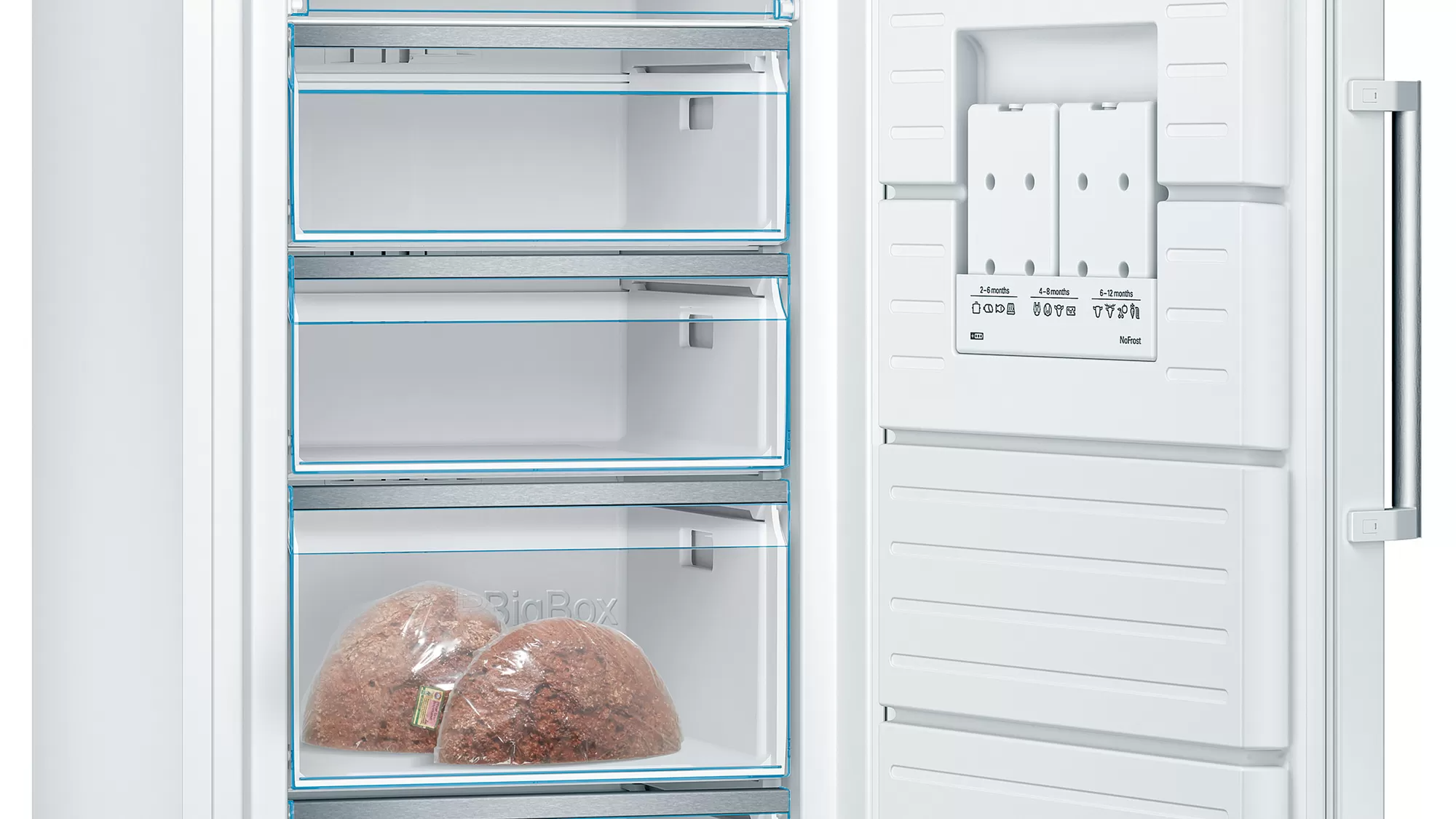 A white fridge freezer, open to show the interior with drawers and frozen food.