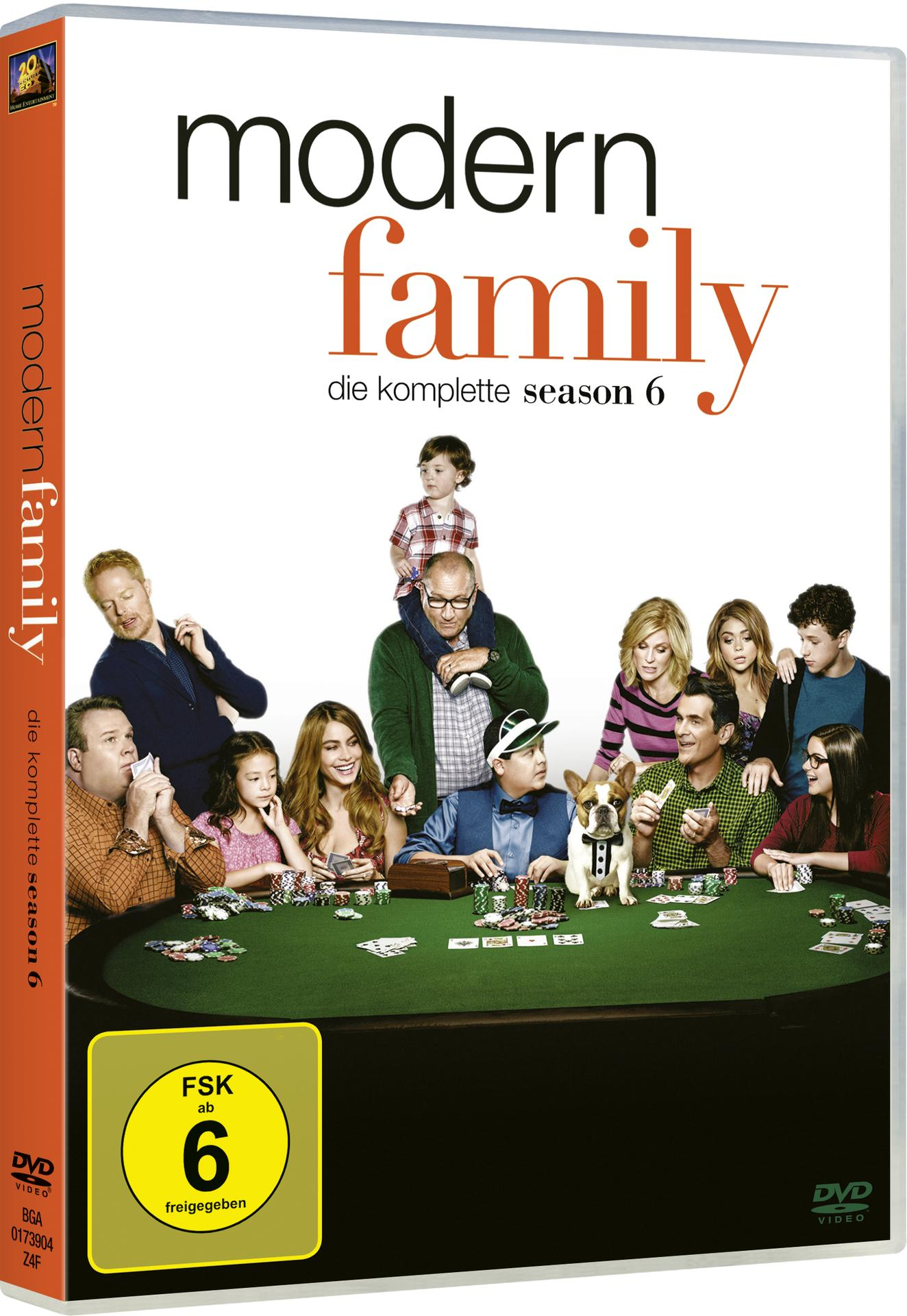 Modern Family DVD-Cover, das eine Gruppe von Leuten an einem Tisch zeigt.