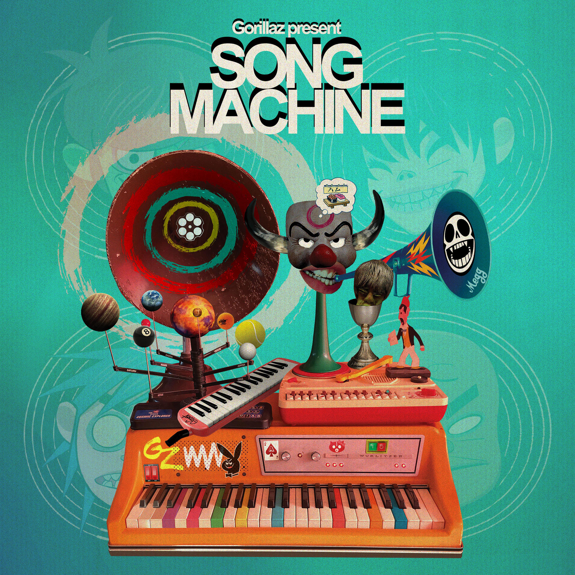 Színes műalkotás billentyűzettel, kürtökkel és egyéb hangszerekkel, a SONG MACHINE szöveggel.