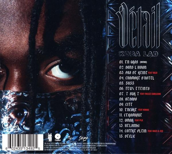 Album cover with eye and text in French. Dark background. Text includes track list.