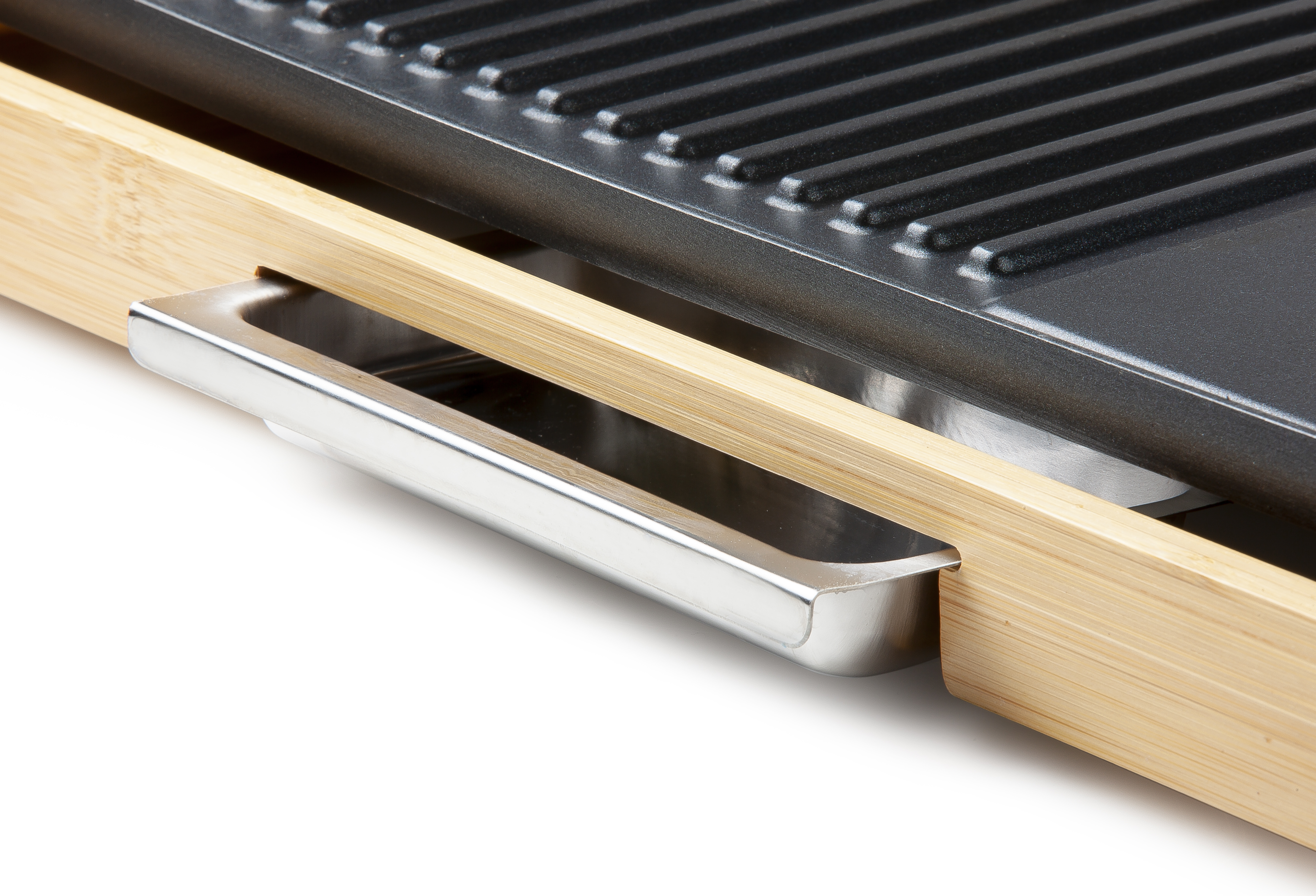 Griddle with bamboo trim, showing handle, and a black griddle surface.