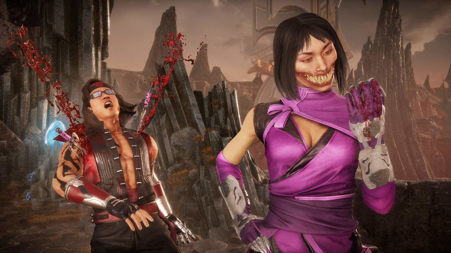 Scena di Mortal Kombat: Liu Kang ucciso. Mileena sorride, schizzi di sangue. Sfondo scuro e infuocato.