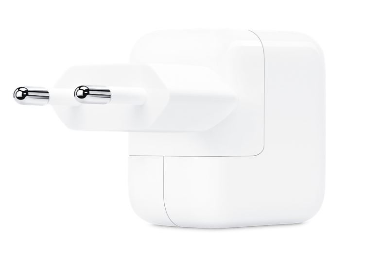 A white Apple power adapter with two metal prongs.