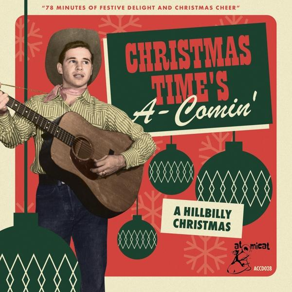 Pochette d'album : Un homme avec une guitare, thème de Noël. Le texte inclut 'Christmas Time's A-Comin'' et 'A Hillbilly Christmas'.