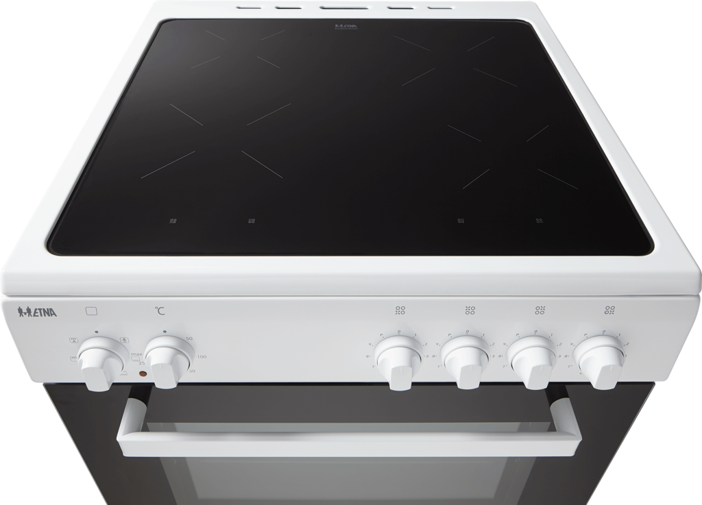 White electric stove with four black cooking zones and control knobs. Oven door is closed.