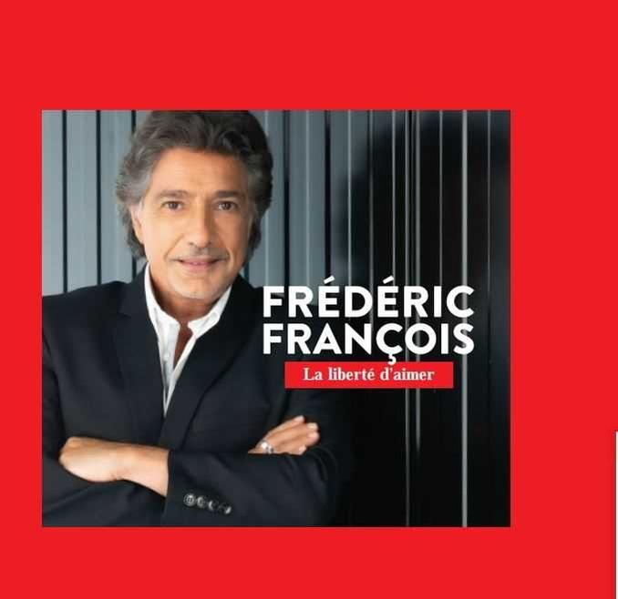 Pochette de l'album de Frédéric François. Homme avec les bras croisés. Fond rouge.