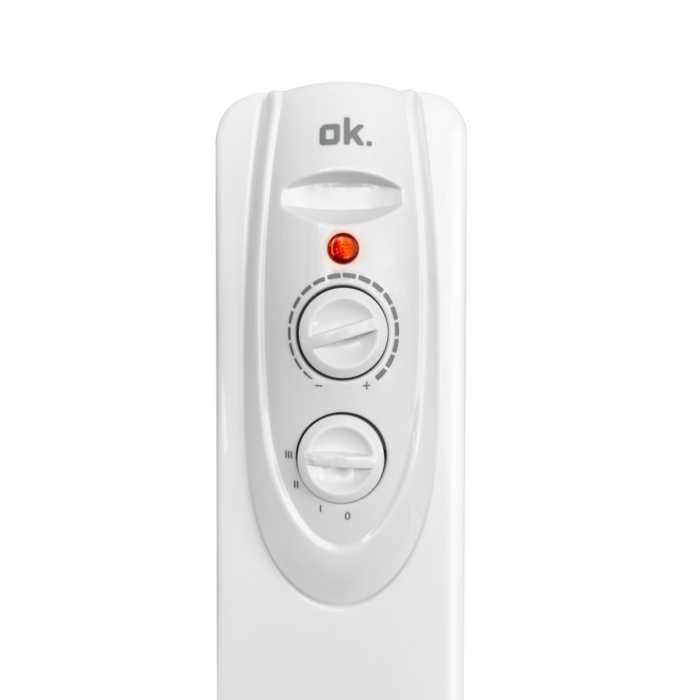 Calentador blanco con diales de control y luz roja.
