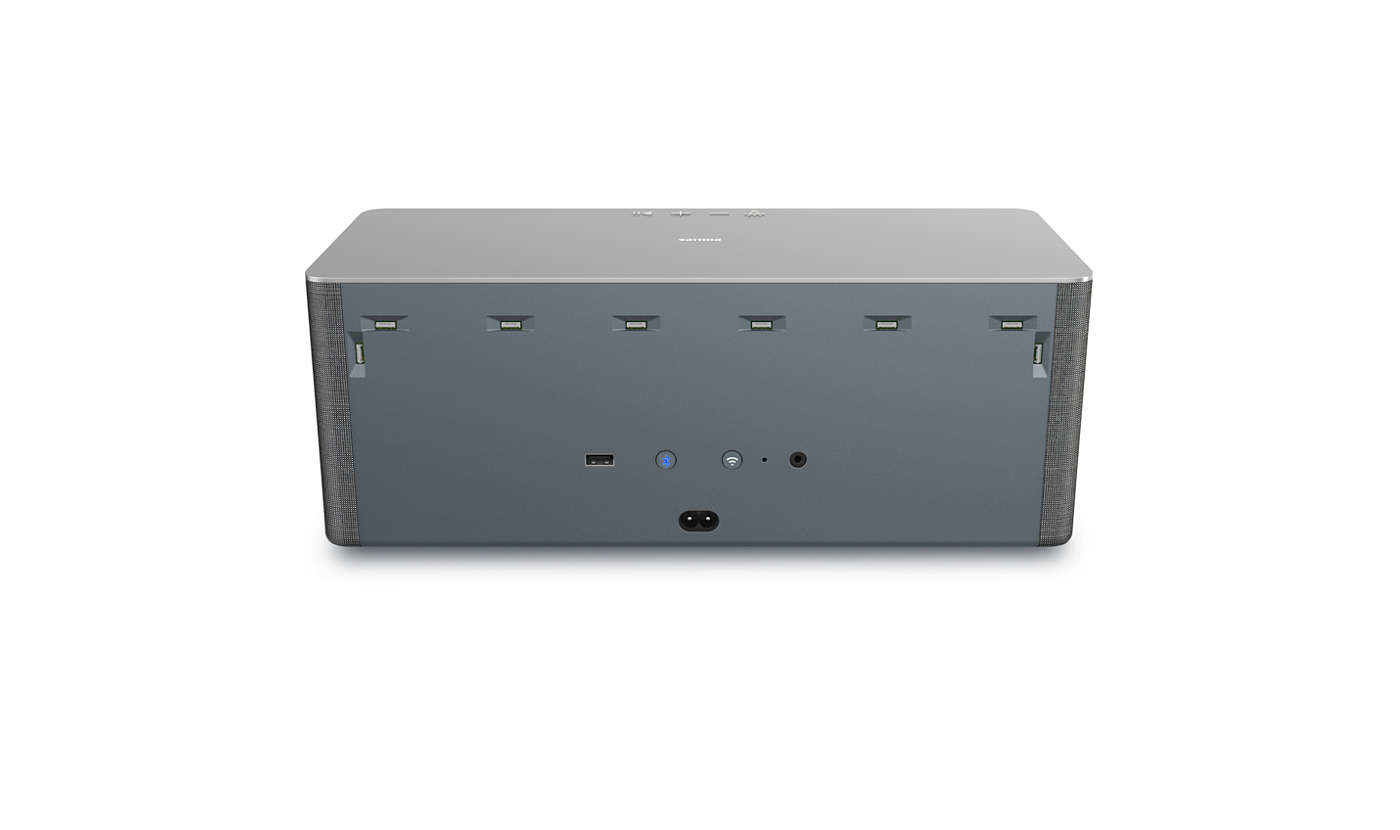 Rückseite eines grauen Philips Audio-Lautsprechers mit Anschlüssen und Bedienelementen.