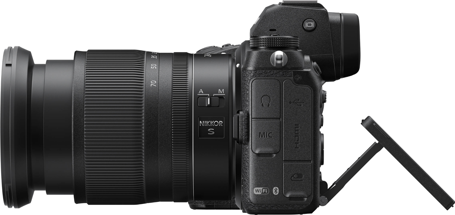 Appareil photo sans miroir Nikon noir avec un objectif, vue latérale.