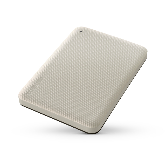 Un disco duro externo Toshiba blanco, con superficie texturizada sobre fondo blanco.