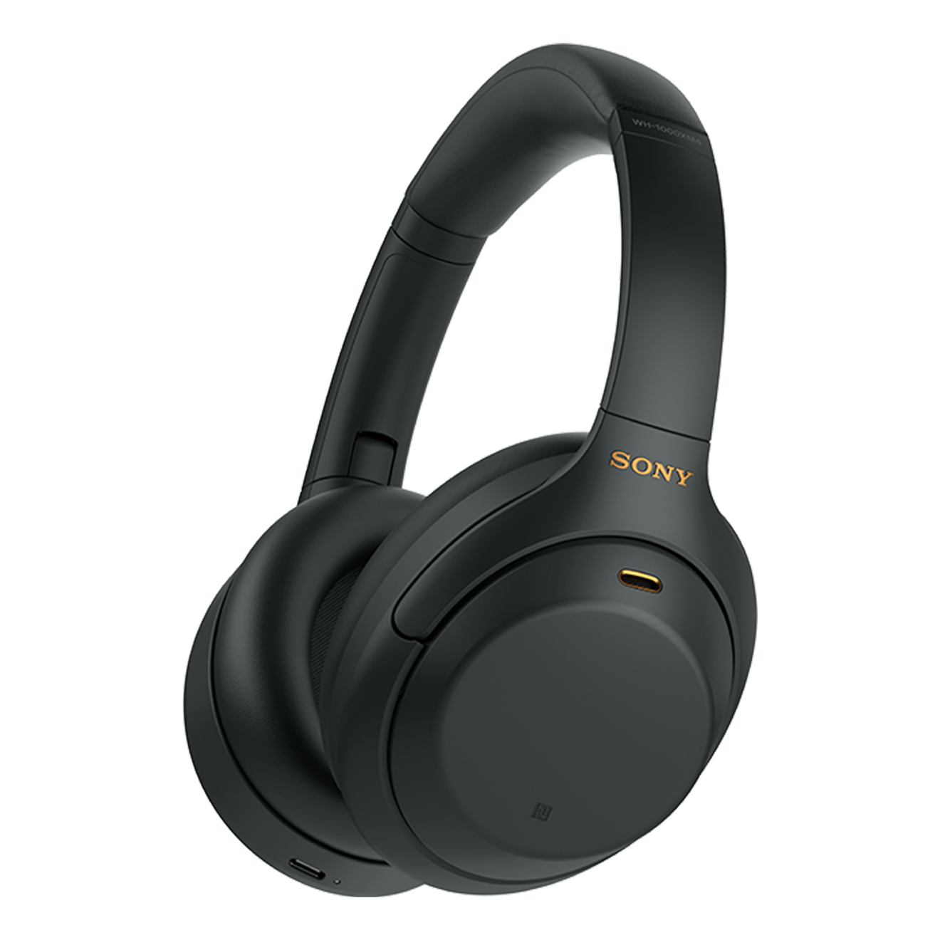 Fekete, fülre illeszkedő fejhallgató arany díszítéssel és a Sony logóval, fehér háttér előtt.