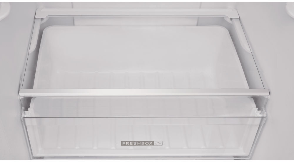 Koelkast freshbox-compartiment, met een doorzichtige plastic lade en een handvat.