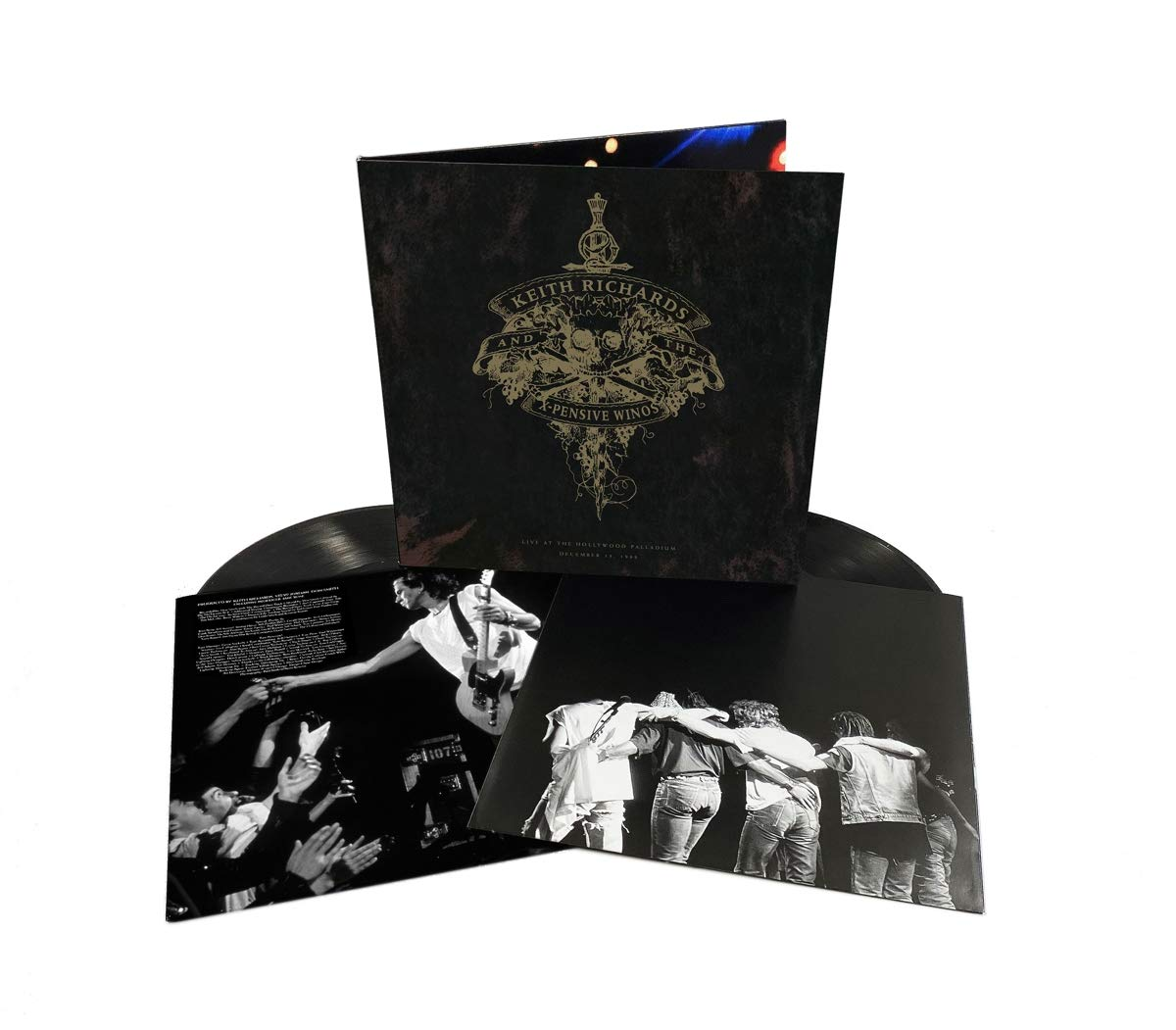 Egy Keith Richards album borítójával és két nyitott lemezzel rendelkező bakelit lemez készlet.
