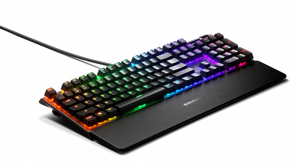 Black gaming keyboard with rainbow lighting, and a wrist rest.