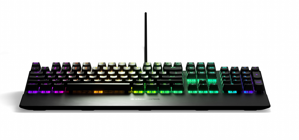 A black SteelSeries gaming keyboard with colorful backlit keys on a white background.