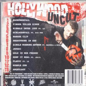 CD-Cover, dunkler Hintergrund. Mann hält einen Kürbis mit Gesicht. Text auf Deutsch.