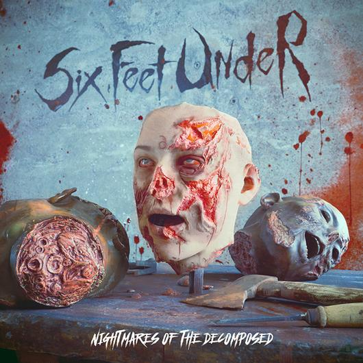 Pochette de l'album Six Feet Under avec un masque et deux autres têtes disséquées.