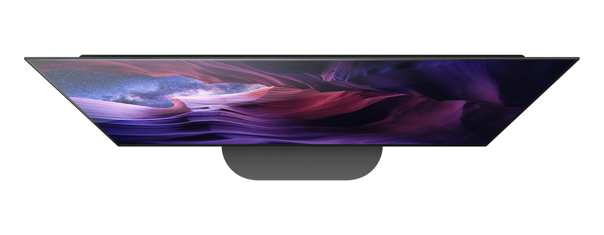 Felülnézet egy nagyméretű televízióról, tájkép jelenettel.