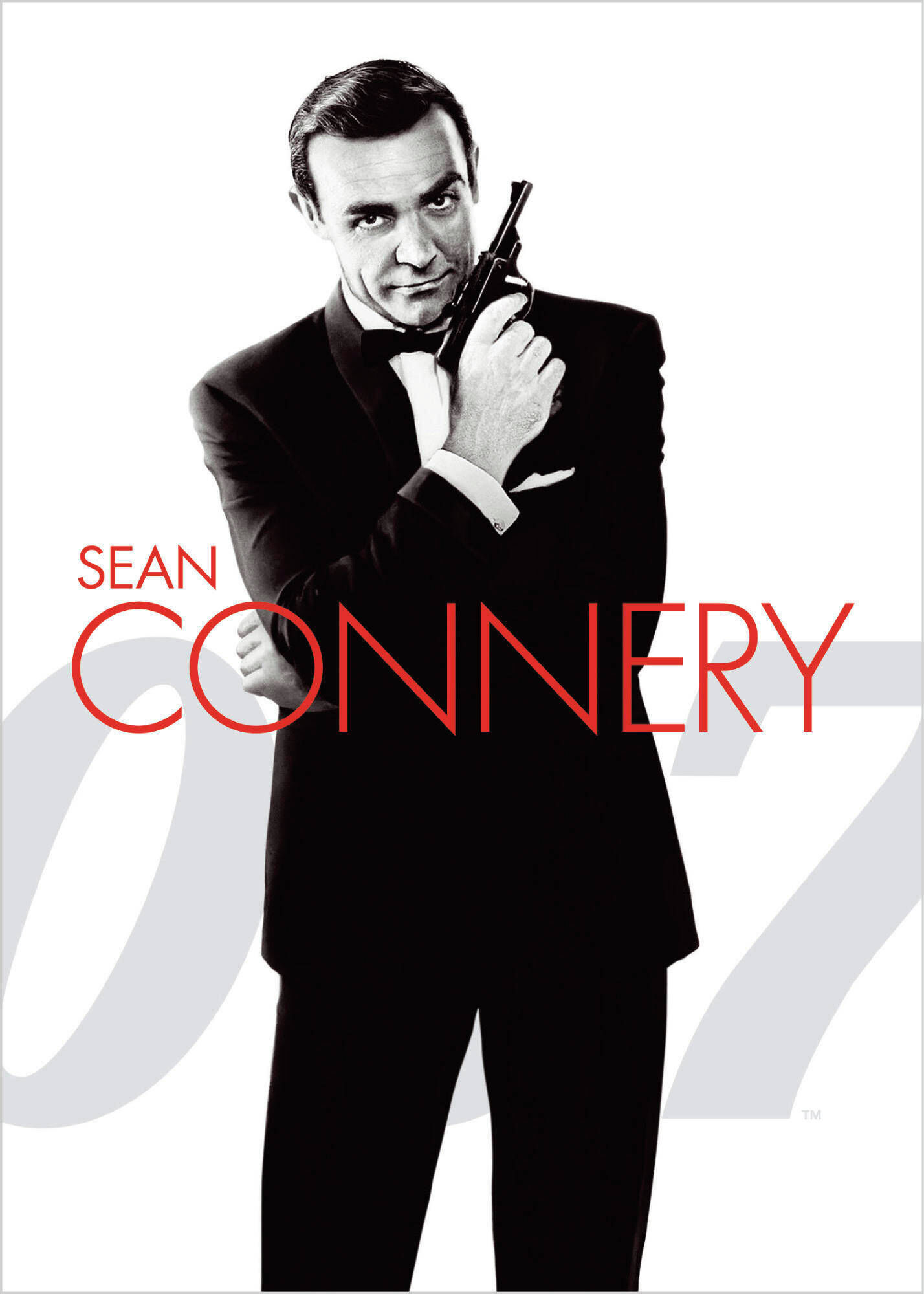 Sean Connery en smoking tenant un pistolet.