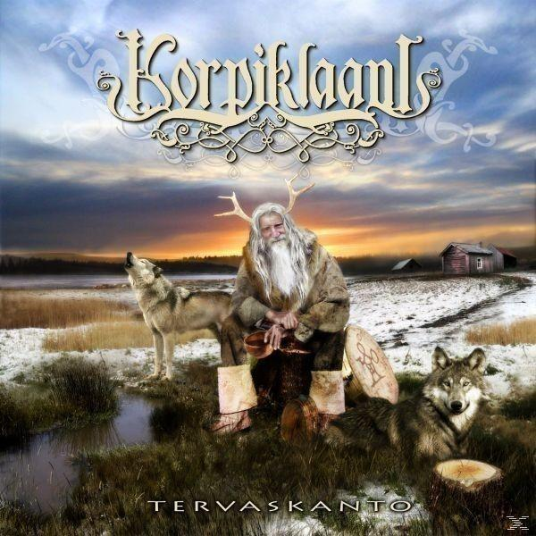 Albumcover von 'Korpiklaani' mit einem Mann in Pelz, Wölfen und einer Schneelandschaft.