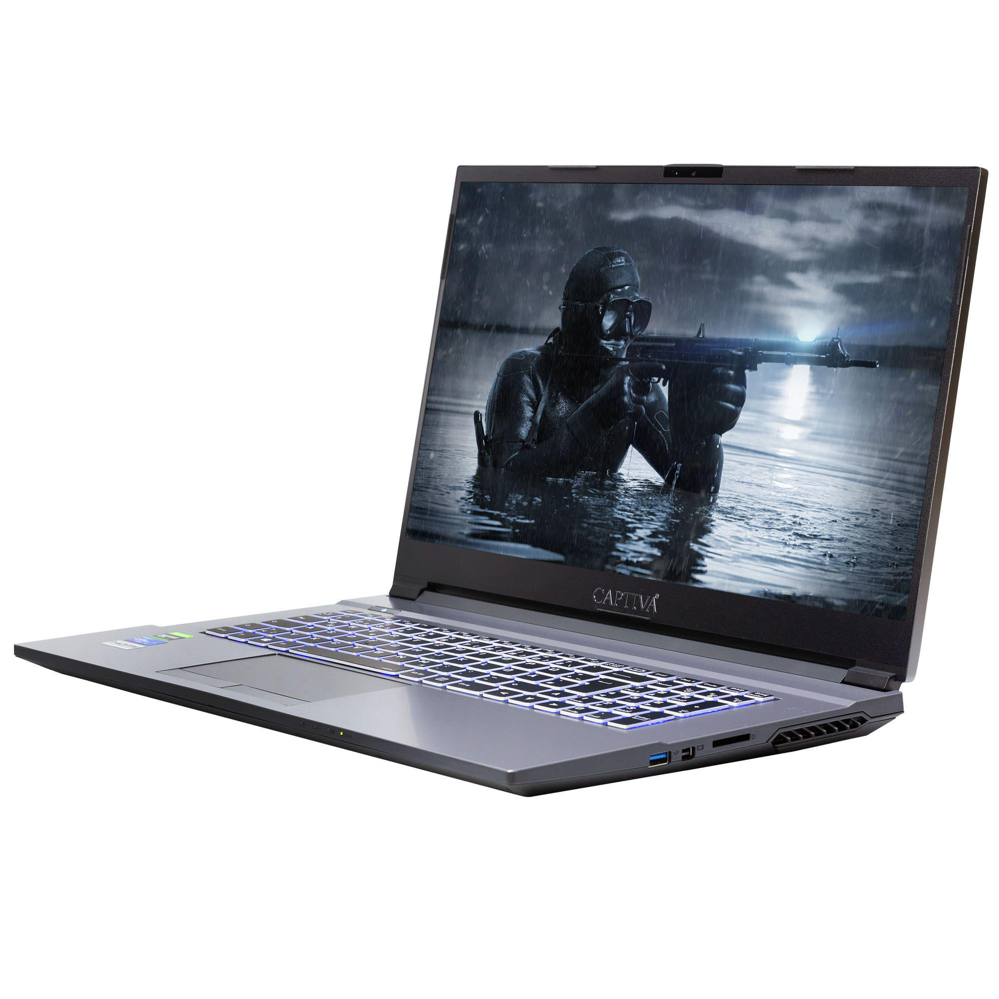 Captiva Gaming-Laptop mit beleuchteter Tastatur zeigt eine dunkle Aktszene auf dem Bildschirm vor weißem Hintergrund.