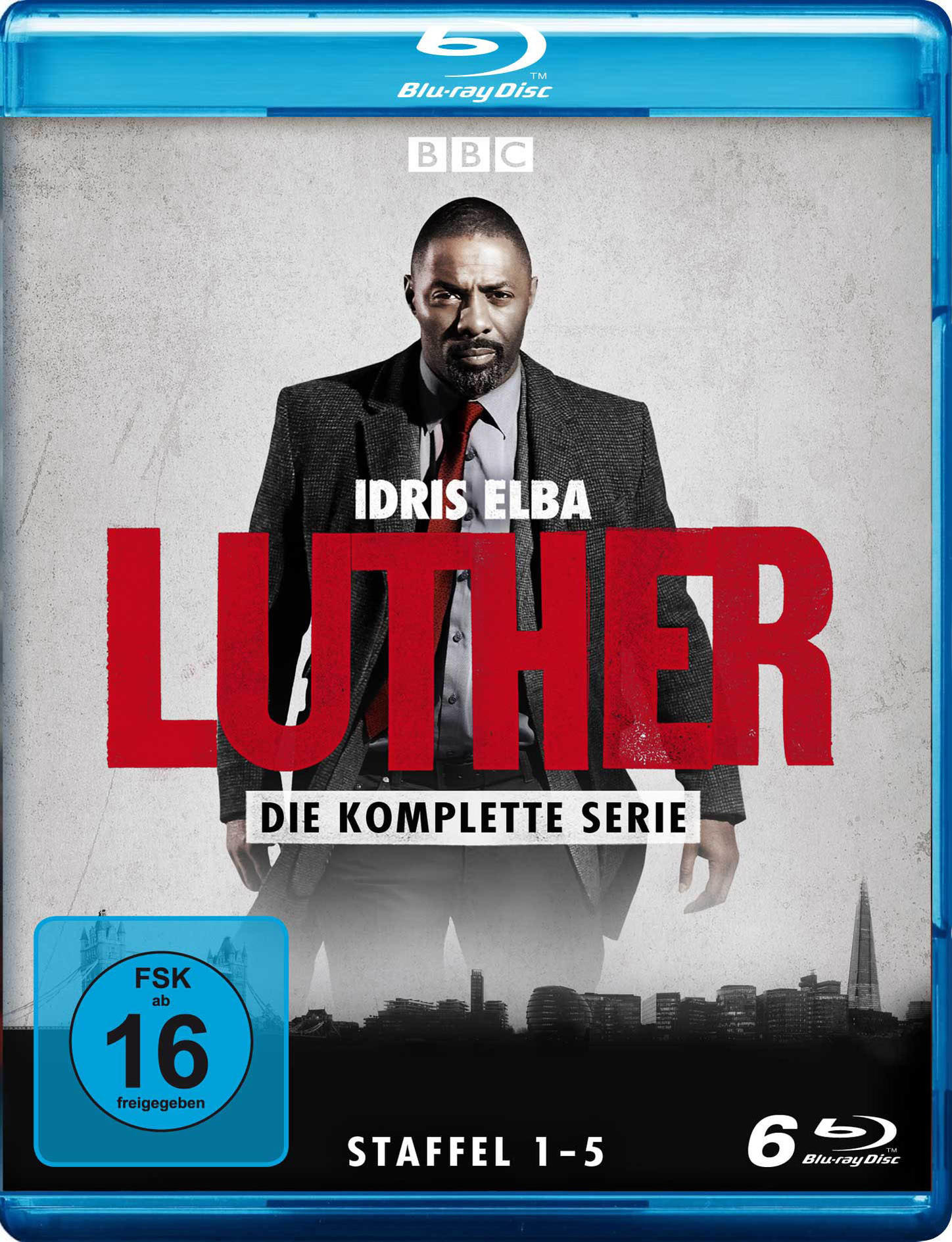 Blu-ray-Disc-Cover von Luther. Idris Elba trägt einen Anzug. Der Titel ist rot. Das BBC-Logo befindet sich oben.