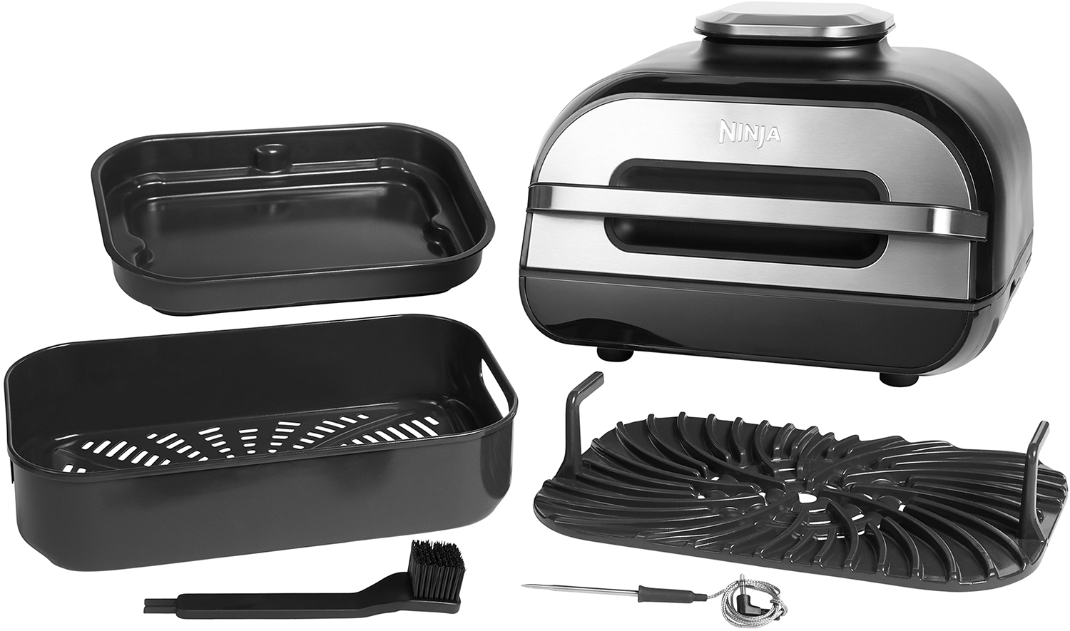 Black Ninja grill and accessories. Includes a griddle, a brush, and a thermometer.