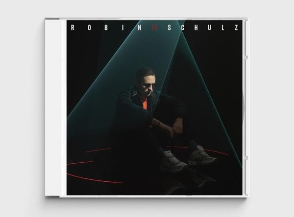 CD-hoes met man in zwarte jas en zonnebril. Artiest: Robin Schulz.