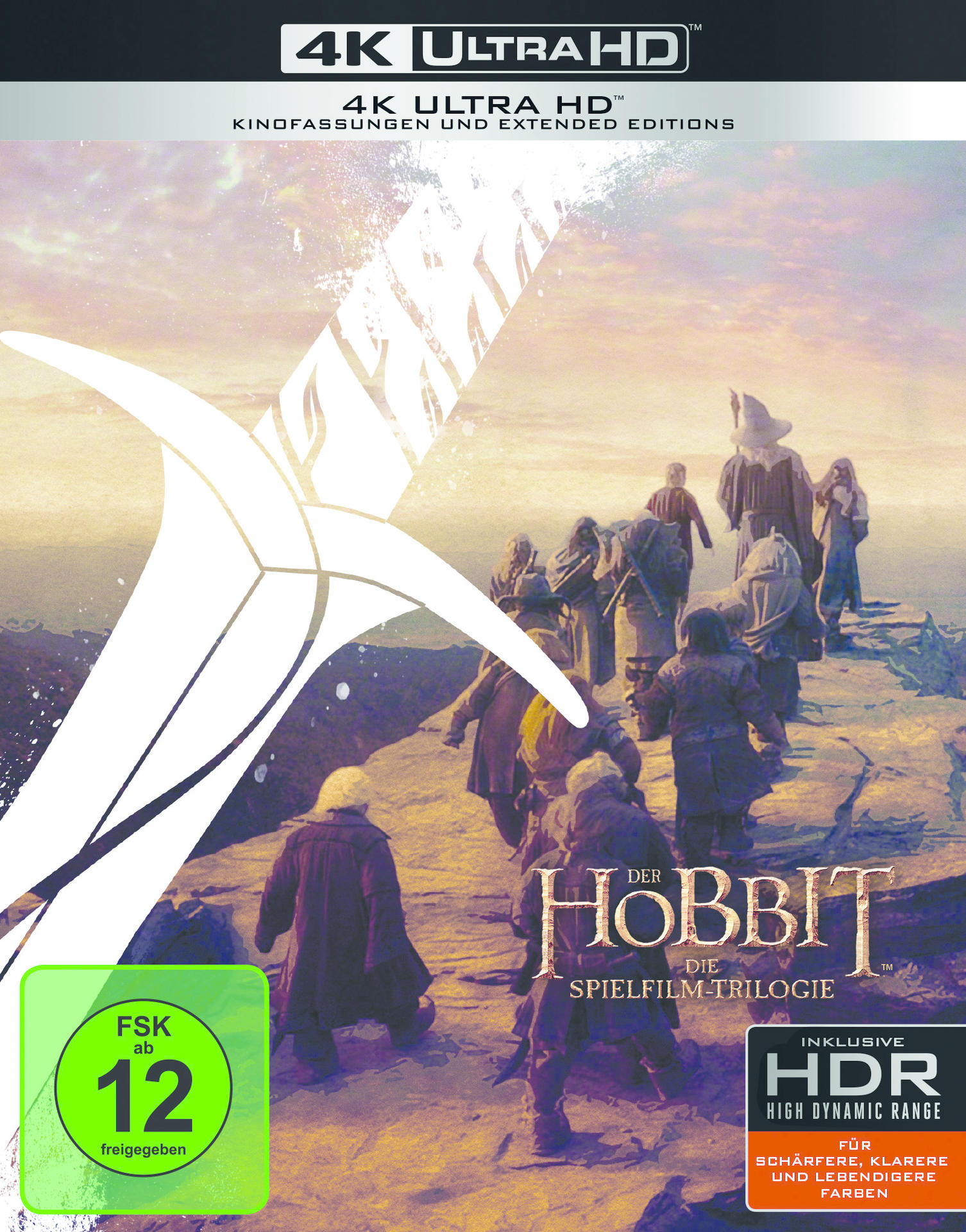 Ein Filmcover für 'Der Hobbit', mit Charakteren, die auf einem Pfad gehen.