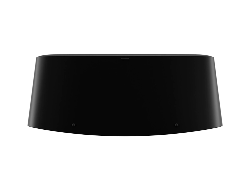 Altavoz negro trapezoidal. La parte inferior tiene tres agujeros circulares pequeños.