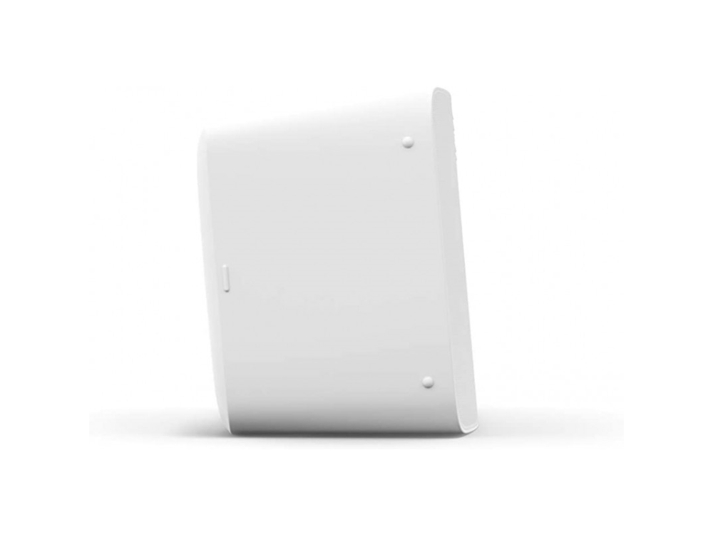 Altavoz blanco ligeramente angulado. Dos puntos pequeños en la parte trasera. Diseño limpio.
