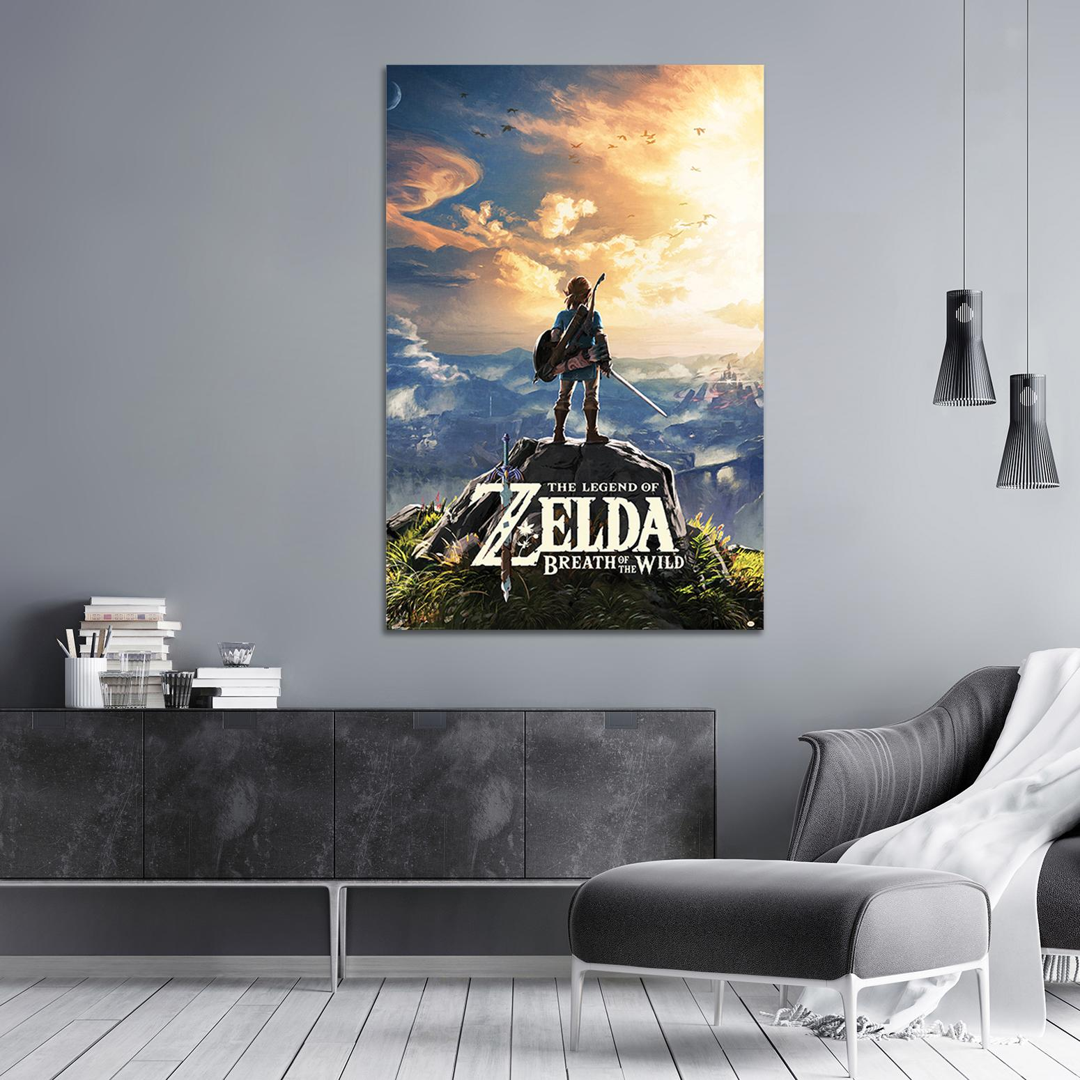 Ein gerahmtes Poster des Spiels The Legend of Zelda mit einer Figur auf einem Berg, in einem Raum.