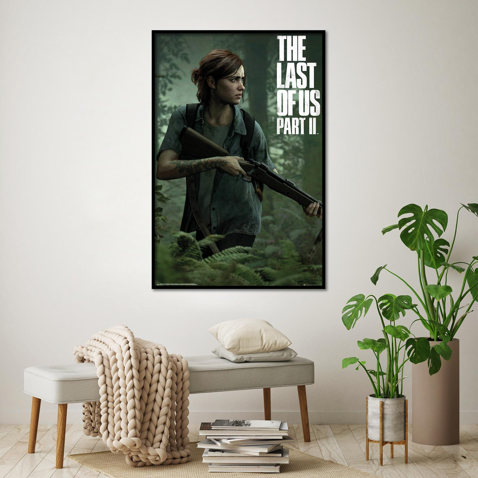 The Last of Us Part II Poster mit Frau und Gewehr.