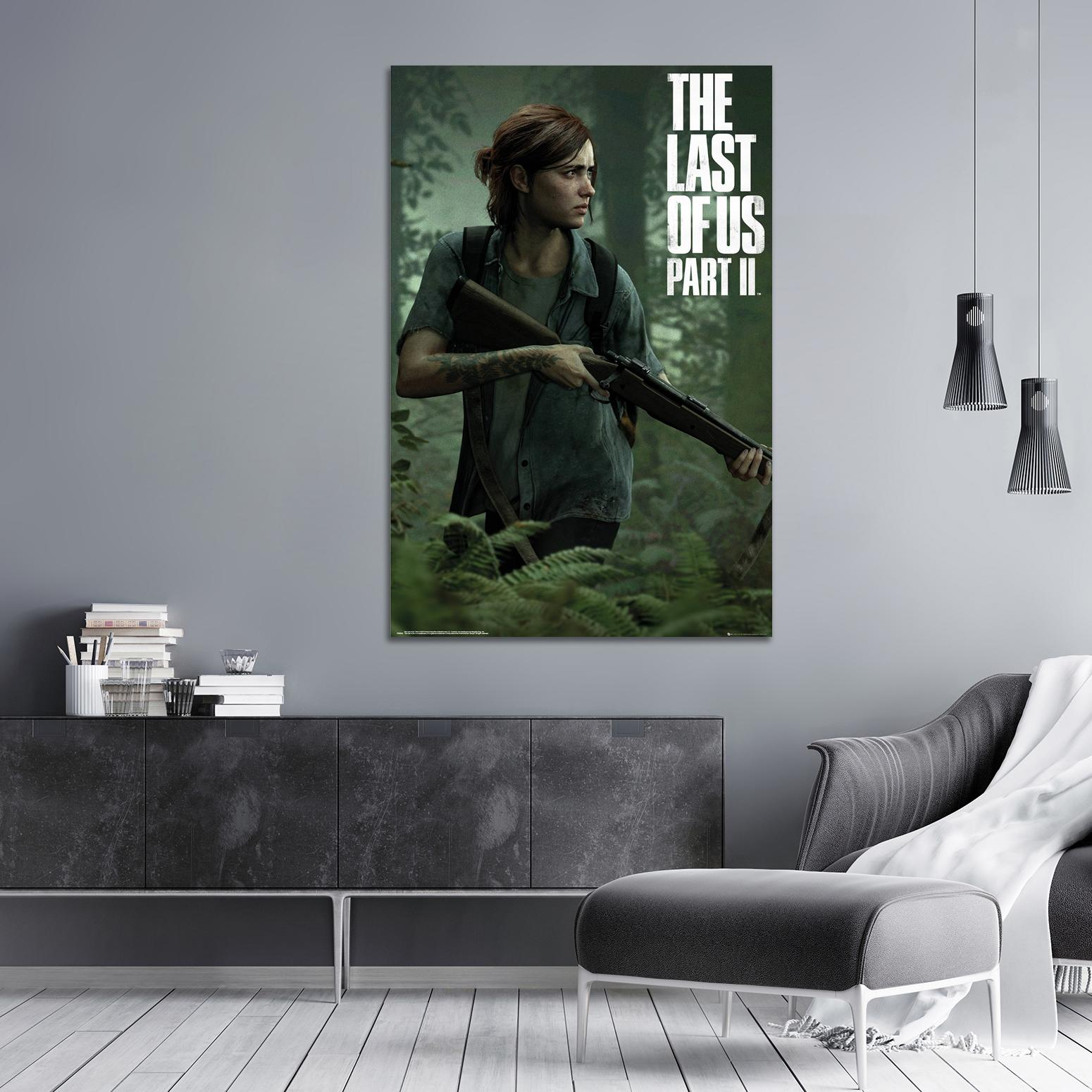 Ein Poster für The Last of Us Part II mit einer Frau, die ein Gewehr in einer Waldumgebung hält.