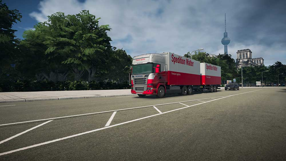 Camion avec 'Spedition Walter' sur le côté, roulant sur une route avec le monument de Berlin.