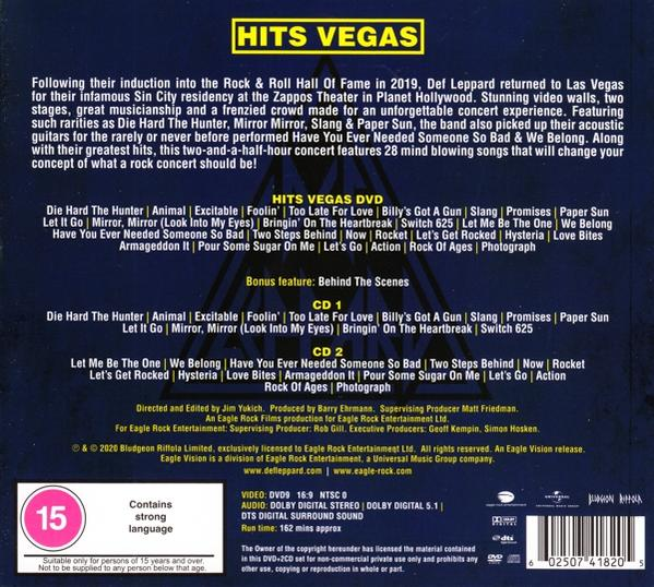 Couverture DVD du concert Hits Vegas avec texte sur les artistes. Fond noir.