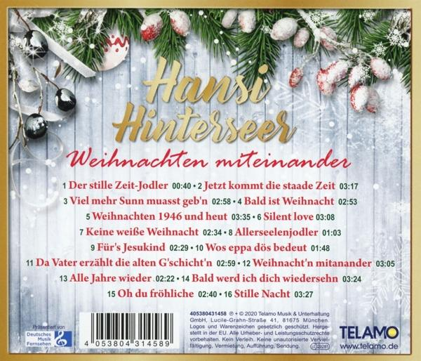 CD-Cover für das Album von Hansi Hinterseer. Schneeflocken, Weihnachtsschmuck und Songtitel werden angezeigt.