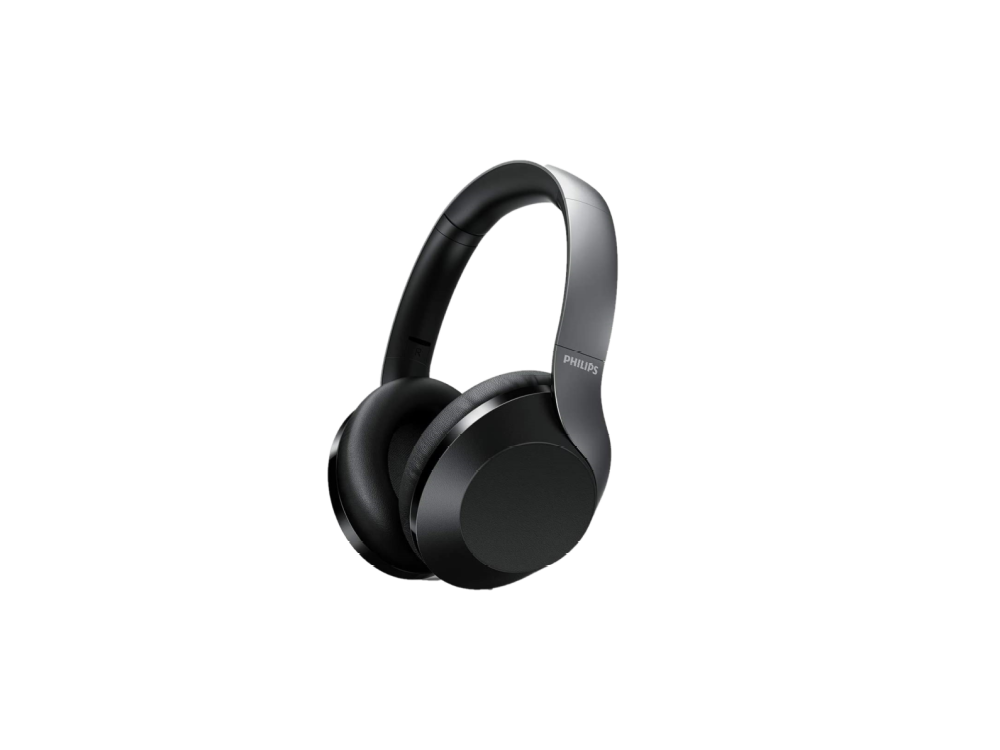 Auriculares negros sobre fondo negro. Los auriculares están ligeramente inclinados a la derecha.