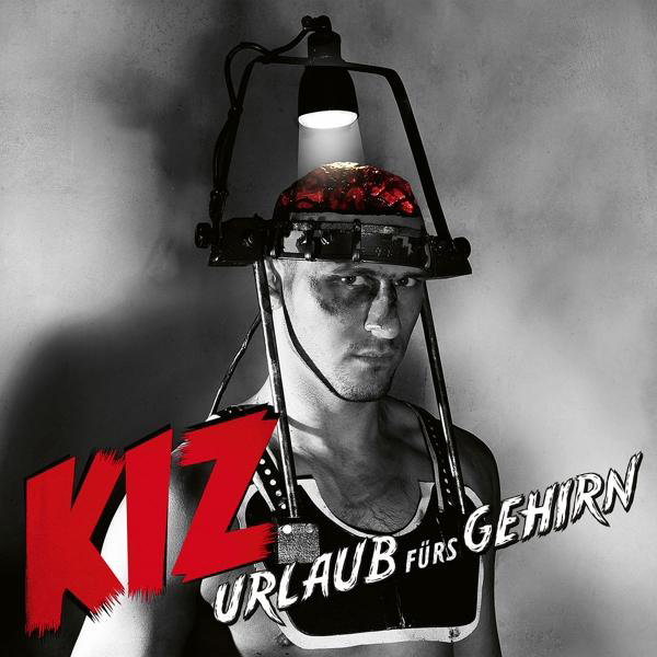 Albumcover. Ein Mann mit Licht auf dem Kopf, Text 'KIZ' und 'URLAUB FÜRS GEHIRN'.