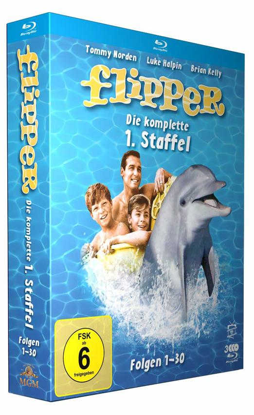 Blu-ray-Box-Set der Fernsehserie "Flipper". Zeigt einen Delphin und drei Personen.