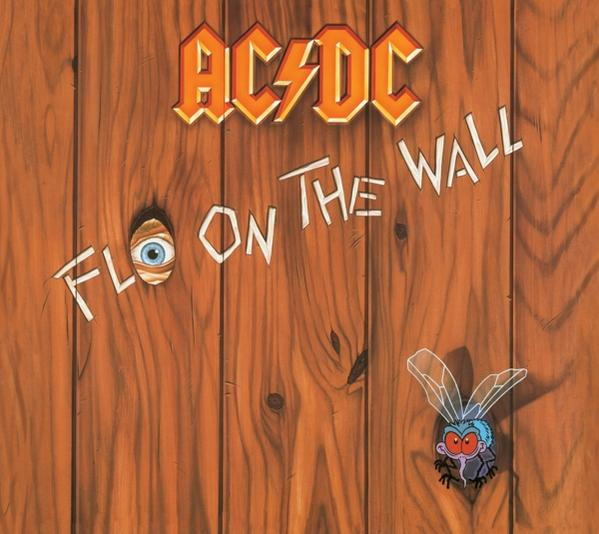 AC/DC album borító. Faajtó légy rajzzal és egy lyukon kikukucskáló szemmel.