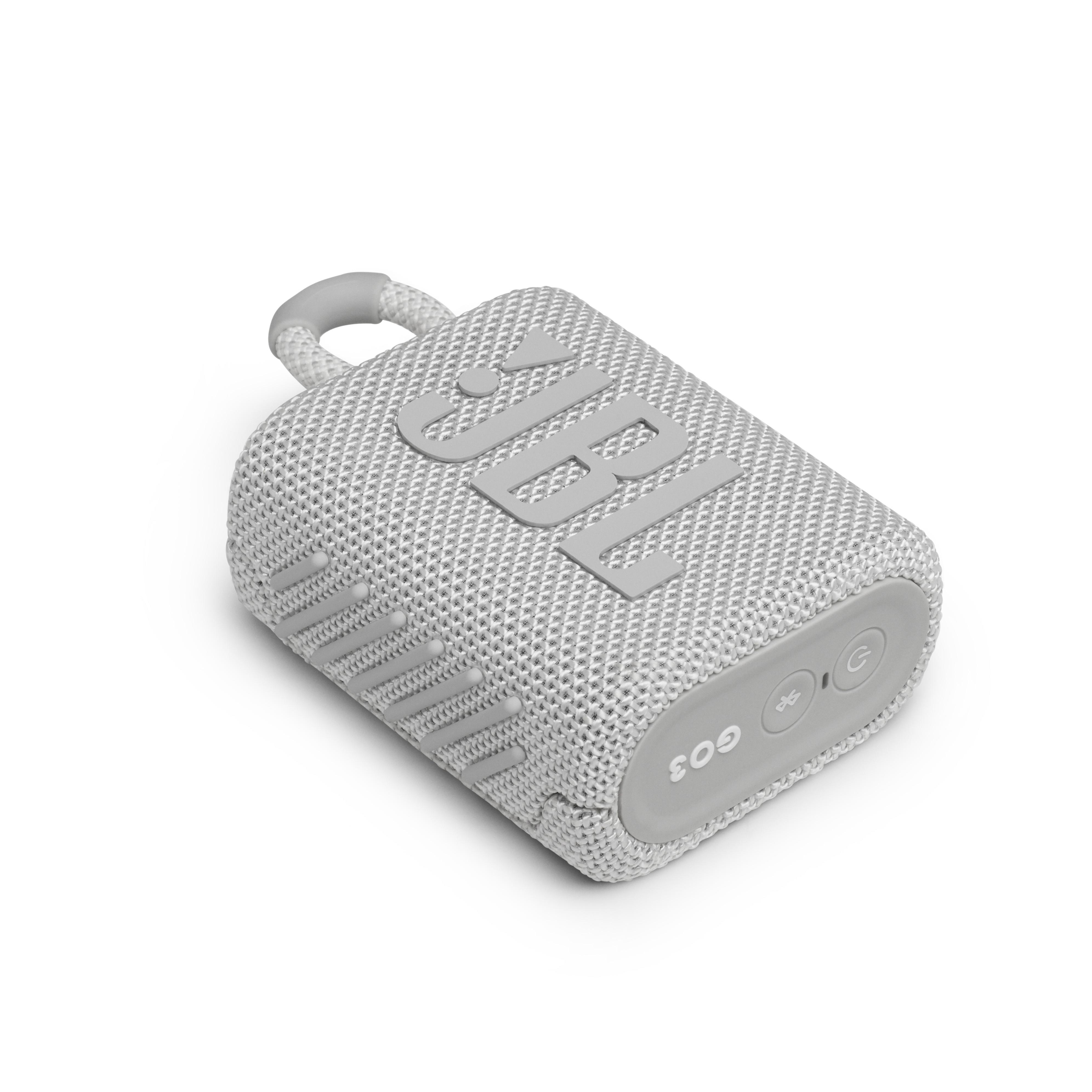 Ein grauer JBL Go 3 Lautsprecher mit grauer Schlaufe, Knöpfen und Logo.