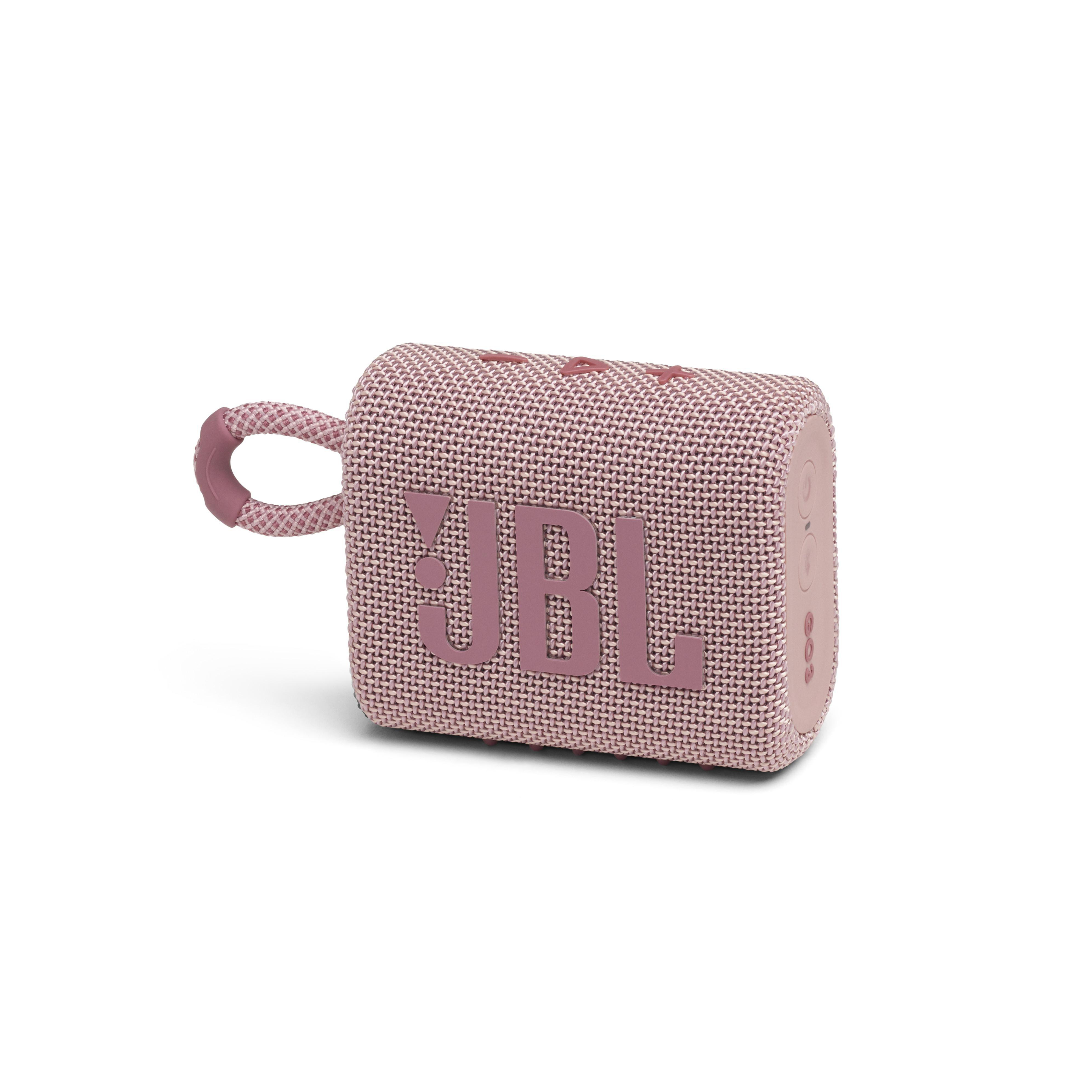 Rosa JBL-Lautsprecher. Er ist rechteckig mit Schlaufe und JBL-Logo. Weißer Hintergrund.